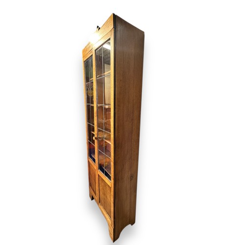 464 - A Glazed Art Deco Style Cabinet. 4 removable shelves, with latch to left side door. 180cm Height x 6... 