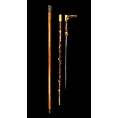 145 - A bone handled sword stick with a white metal topped walking stick. Qty 2