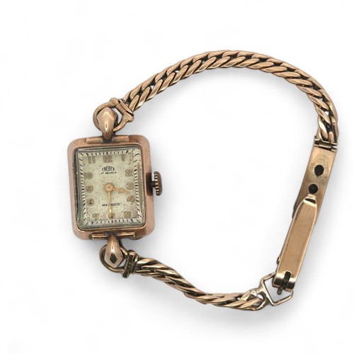 82 - A 9ct gold Trebex 17 jewel watch with rectangular dial on a bracelet marked Chaincraft, 9ct. 19.78g.... 