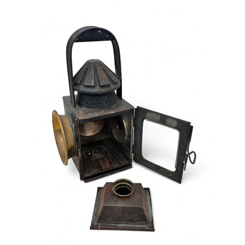 275 - Interesting Old Railway Lamp. Large clear circular lens to one side with brass deflector, another la... 