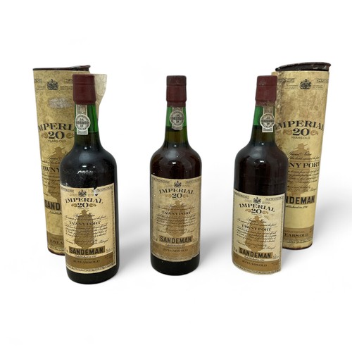 154 - Sandeman Trio of Imperial 20 Years Old Tawny Port; two of which are boxed and all are sealed.