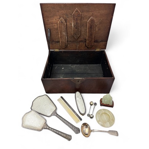 119 - Collection of items including a silver ladle, two teaspoons stamped Indian silver, an embroidered si... 