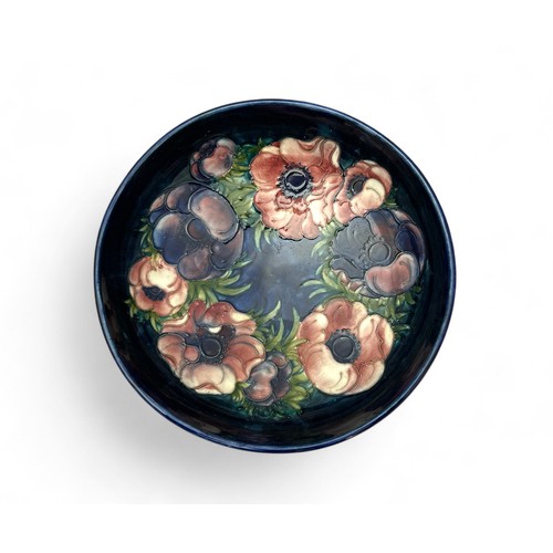 356 - Moorcroft, a Moorcroft anemone patter fruit bowl. Impressed to base and signed, height 9cm, diameter... 