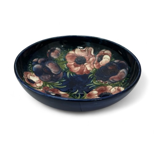 356 - Moorcroft, a Moorcroft anemone patter fruit bowl. Impressed to base and signed, height 9cm, diameter... 