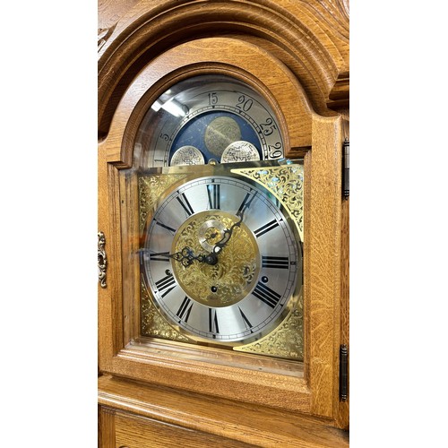 472 - Hermle - German Made Grandfather Clock. With pendulum, three weights and keys. Originally purchased ... 