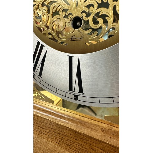 472 - Hermle - German Made Grandfather Clock. With pendulum, three weights and keys. Originally purchased ... 