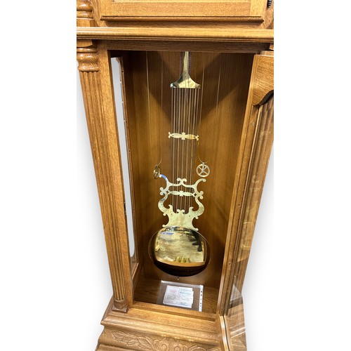 472 - Hermle - German Made Grandfather Clock. With pendulum, three weights and keys. Originally purchased ... 