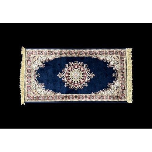 373 - Oriental / Middle Eastern silk rug, navy with cream detailing, foliate pattern. 155cm x 77cm.