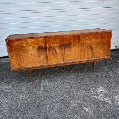 456 - Mid-century teak sideboard with two sliding doors and five central drawers, potentially Folke Ohlsso... 