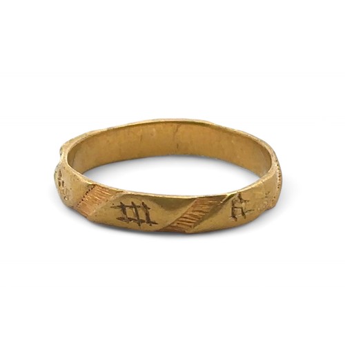 48 - A medieval posy ring dated 13th to 15th Century.  The outer of the D shaped band decorated with diag... 