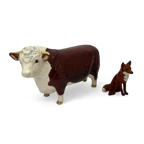 352A - Beswick Bull (Champion of Champions) and seated Fox, both marked to base. Qty 2