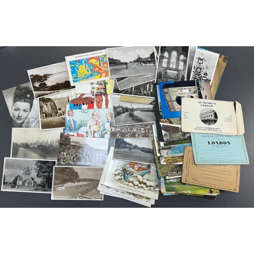 320A - Collection of postcards (70+), from 1930's to modern, some RP's, comic cards, souvenir sets etc, not... 