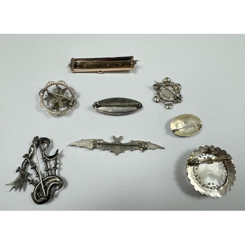 60 - Eight brooches, including a silver and Blue John brooch, a gilt and seed pearl brooch, a white metal... 