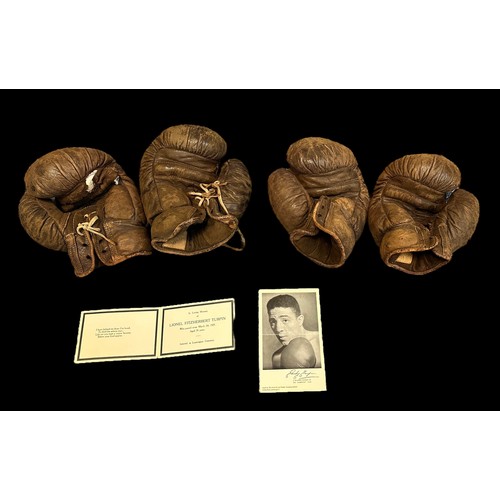 317 - Two pairs of vintage boxing gloves with a Randy Turpin's printed autograph. Also includes a card fro... 