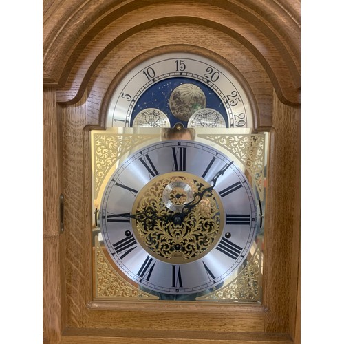 472 - Hermle - German Made Grandfather Clock. With pendulum, three weights and keys. Originally purchased ... 