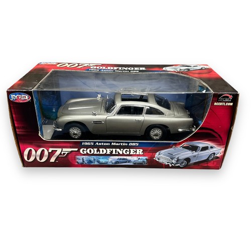 159 - Joyride (Ertl RC2) 1/18th scale James Bond Aston Martin DB5 1965 Goldfinger No. 33745E, generally ex... 