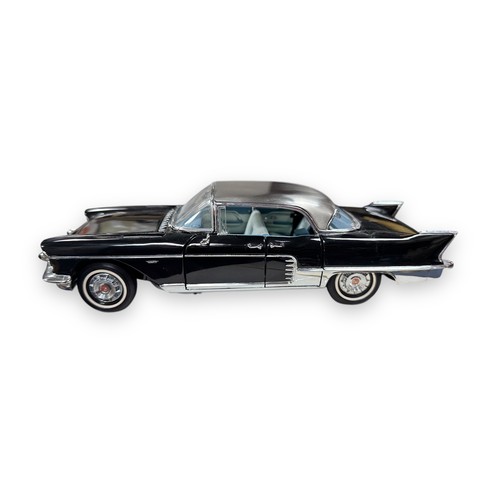 148 - Franklin Mint 1/24th scale 1957 Cadillac Eldorado black with brushed steel-effect silver roof, two-t... 