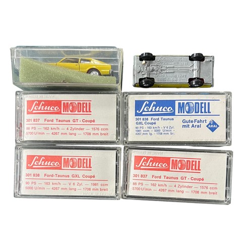 232 - Schuco 1/66th scale Ford Taunus Coupe collection including GT Coupe red No. 301 837 (2), GXL Coupe b... 