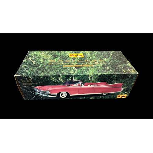 181 - Maisto 1/12th scale 1959 Cadillac Eldorado Biarritz white with red interior, generally excellent in ... 