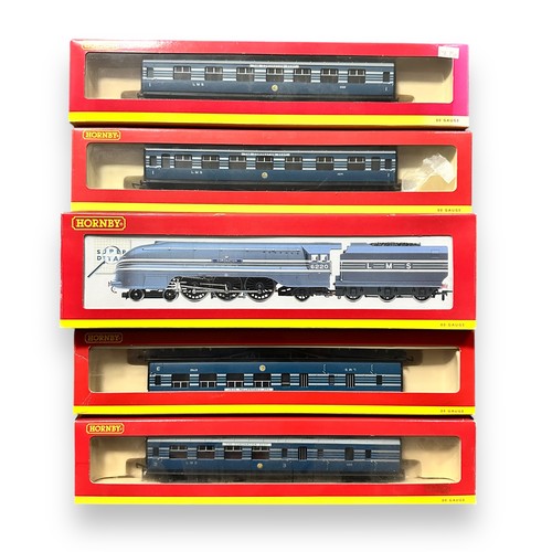 320 - Hornby LMS blue 6220 Coronation 4-6-2 locomotive and tender No. R2206, plus Coronation Scot blue coa... 