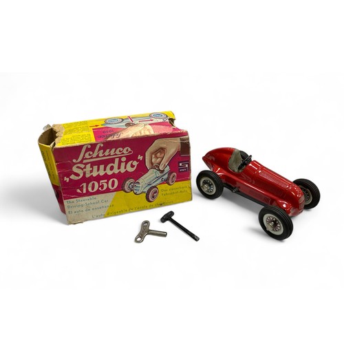 233 - Schuco Studio Racer No. 1050, red with race#2, tinplate, clockwork with key and Schuco hammer, gener... 