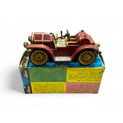 234 - Schuco Micro Racer No. 1036/1, maroon, tinplate, clockwork (without key), generally excellent to goo... 