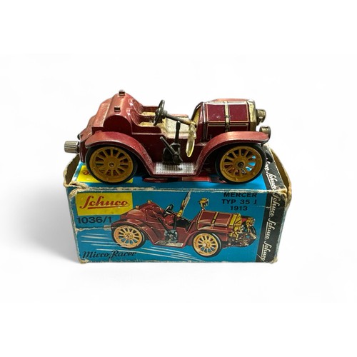 234 - Schuco Micro Racer No. 1036/1, maroon, tinplate, clockwork (without key), generally excellent to goo... 