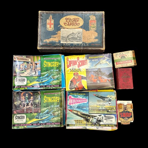 216 - Jigsaws puzzles including Waddington's Thunderbirds, Stingray (2) and Captains Scarlet, etc., genera... 