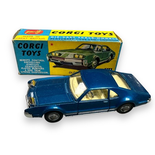 83 - Corgi Oldsmobile Toronado No. 264, metallic blue, cream interior and cast hubs, generally excellent ... 