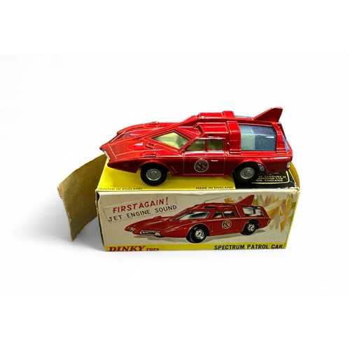 100 - Dinky Captain Scarlet's Spectrum Patrol Car No. 103, metallic red body, blue tint windows, lemon yel... 