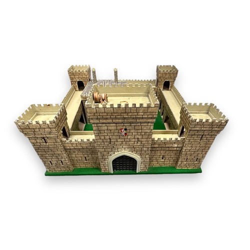 213 - Toy soldiers with custom made fort. The corners of the castle are bolted to the board, but the rest ... 