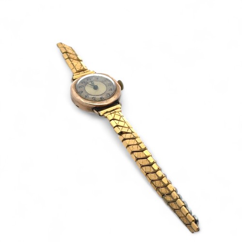 147 - A 9ct gold 15 jewel watch on broken Excalibur bracelet. Unsigned dial. Hallmarks to inner Dennison c... 