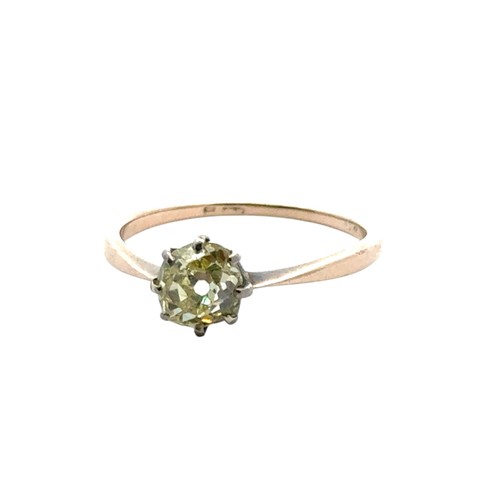 25 - An old mine cut fancy light yellow (estimated) diamond ring, size O. Set in unmarked gold.  Clarity ... 