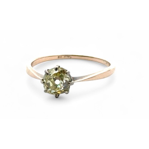 25 - An old mine cut fancy light yellow (estimated) diamond ring, size O. Set in unmarked gold.  Clarity ... 