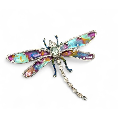 11 - A large silver dragonfly brooch and pendant (combined) set with an oval light green tourmaline and d... 