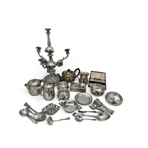 183 - A range of silver plated and white metal items