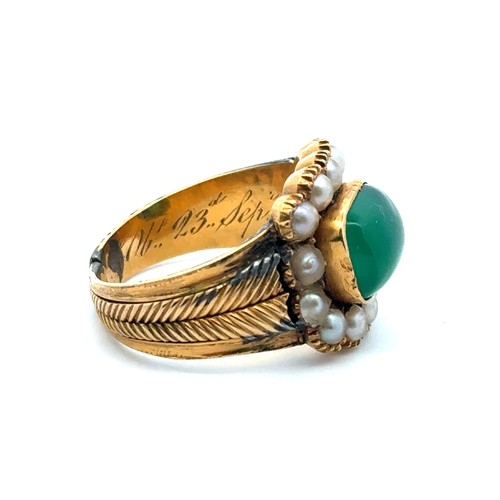 30 - A George III split pearl and chrysoprase mourning ring in unmarked yellow metal. Inscribed to inner ... 