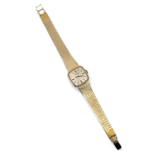 136 - Rolex - a ladies 14ct gold watch on a 14ct gold bracelet. Rounded square champagne dial with gold to... 