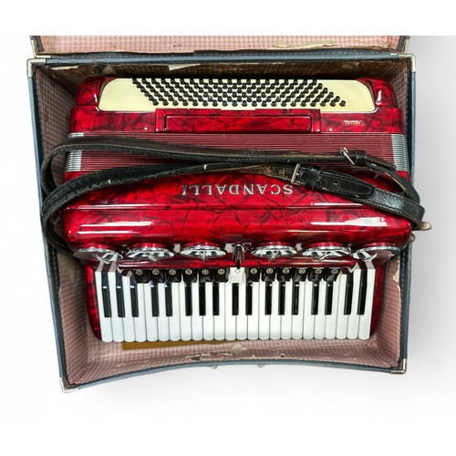 315 - Scandalli bass 120 Barevetto Piano Accordion, in a polished patterned red finish. Comes with origina... 