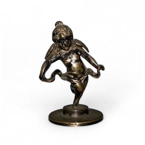 212 - Unusual brass Cherub car mascot, height 10cm.