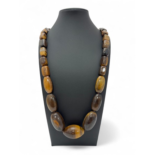 58 - A long tiger's eye bead necklace, approx 34