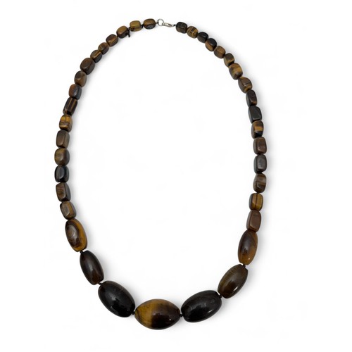 58 - A long tiger's eye bead necklace, approx 34