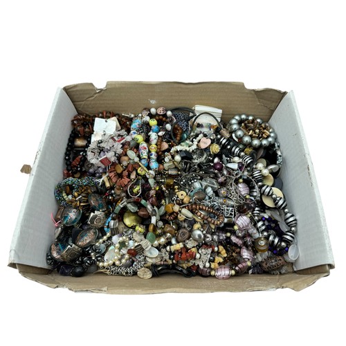 127 - A box of hardstone, mineral and costume jewellery.