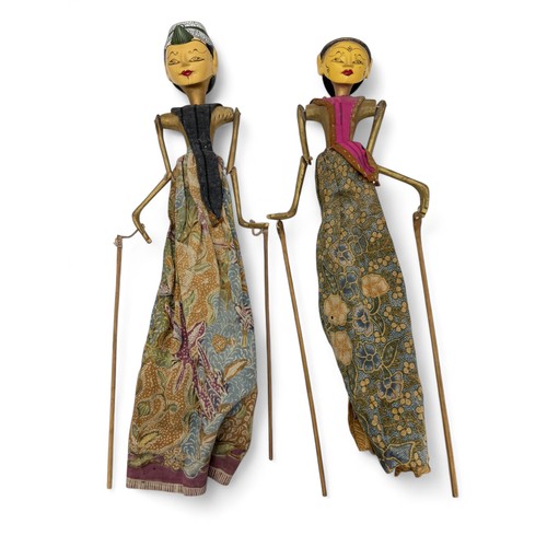 344 - Two Indonesian wooden rod puppets. approx 50cm in length