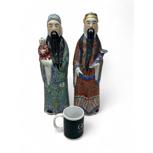 332 - Two Chinese Famille Rose figures of Immortals, likely late 19th / early 20th century. Height of tall... 