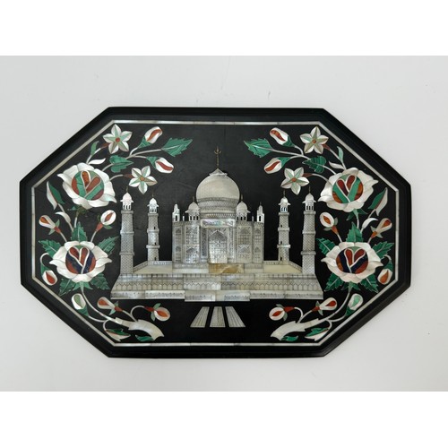 338 - A pietra dura and mother of pearl  plaque with decoration of the Taj Mahal. Inlaid with malachite an... 