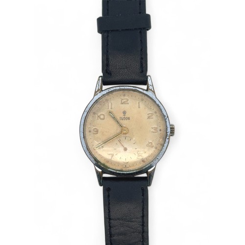 133 - Tudor  - A vintage Gent's Tudor watch on a black leather strap. In original box with instructions.  ... 