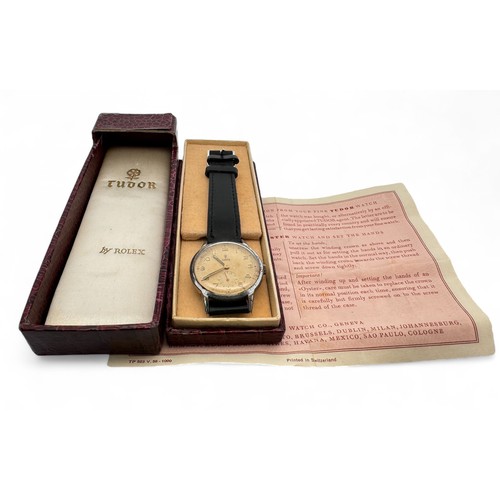 133 - Tudor  - A vintage Gent's Tudor watch on a black leather strap. In original box with instructions.  ... 