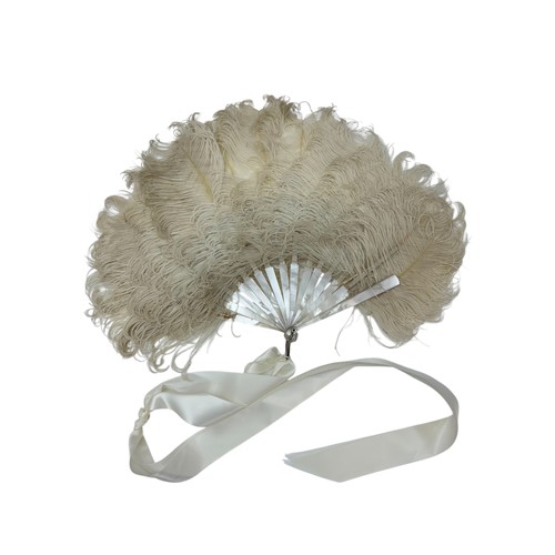 318 - An Ostrich feather and mother of pearl fan