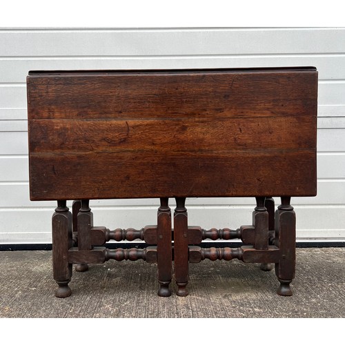 450 - An early 19th Century cottage gateleg table with a single gate. Width 90cm x Depth 31cm (opening to ... 